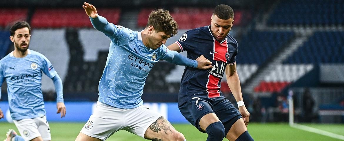 John Stones et Kylian Mbappé
